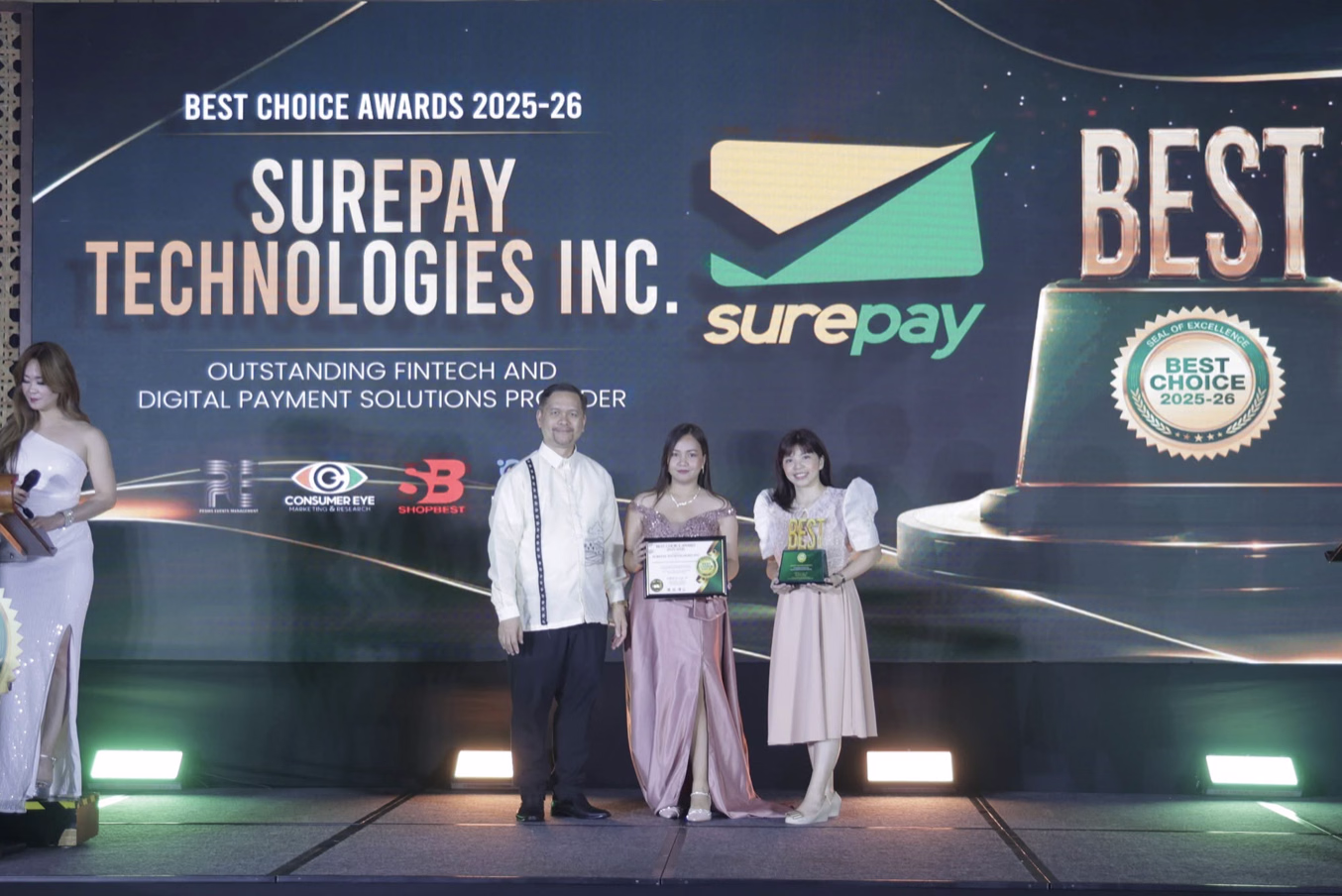 Surepay representatives receiving the Outstanding Fintech and Digital Payment Solutions Provider award on stage at the Best Choice Awards 2025–26 Gala Night